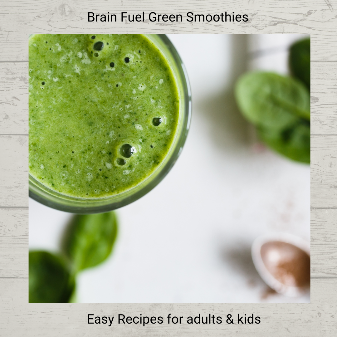 Basic green smoothie ingredients including greens, fruits, and protein powder in a blender for brain fuel